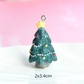 Detail of green resin Christmas tree pendant with glitter finish, measuring 2x3.4cm - Style 23-Green Tree with Colorful Dots