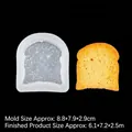 White silicone toast mold with a realistic gold finished toast slice model - Small / Clear