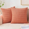 Close-up of two coral pink corduroy pillow covers on a beige sofa in a cozy room - 45*45cm (Pillow Not Included) / Coral