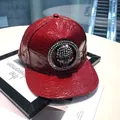 Red crocodile texture PU baseball cap featuring a black rhinestone skull badge ornament - Red - Circle Skull