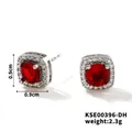 Macro view of silver square zircon studs with red centerpiece and dimensions 0.9x0.9cm - Silver-Red Zircon