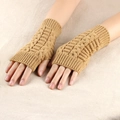 Detailed close-up of camel knit fingerless gloves with cable knit pattern for women - One Size / Camel