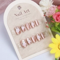 Pink cat eye press-on nails with 3D white flower design and green leaf accents - By1581 / Glue Type