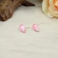 Pink resin geometric stud earrings with silver pins on a minimalist fabric background - Light Pink Pomegranate Seed Earrings Pair