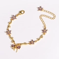 Bracelet doré délicat avec fleurs en cristal violet et pendentif nœud serti de zircons - Violet Or