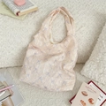 Hellrosa Tragetasche mit lila Schleifenmuster und strukturierter Sommerstoff - Standardtyp / Rosa