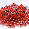 Flat round red resin evil eye beads with black and white pupil detail for DIY jewelry - Red