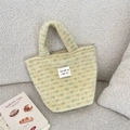 Cute pale yellow plush tote bag with colorful mosaic dots and a woven brand label - Iridescent Yellow
