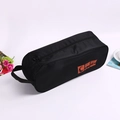 Black waterproof shoe storage bag with orange handle and shoes icon for travel - Black