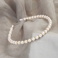 Elegant cream pearl headband with gold rhinestone spacers on a textured grey mesh background - 16# Pearl Rhinestone Headband