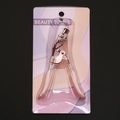 Eyelash curler with pink handle and rose gold metal in purple blister card packaging - Electrophoresis Pink Curler with Comb Pink Duckbill Handle Matching Rubber Pad Blister Card Pack