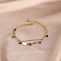 Gold double-layer bracelet with black beads and a heart pendant on champagne silk - Black Beads Heart / Gold Double Layer Heart Pendant