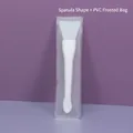 White silicone spatula face mask brush with spade tip and frosted PVC storage bag - PVC Frosted Bag / Spade Shape