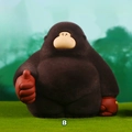 Cute brown gorilla figurine with red gloves and thumbs up gesture on green grass - W1239-1 Brown [Large]