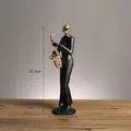 Statuetta moderna di sassofonista nero e oro per decorazione elegante di mensole - Sassofonista (Oro)