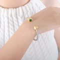Silver-tone twisted cable cuff bracelet with green gemstone and gold-plated accents - Z235-Green Zirconia Double Layer