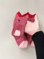 Funny pink knit crocodile socks with cute button eyes and unique animal-inspired design - Kids Red Fish