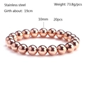 Detailed view of 10mm rose gold stainless steel beads on a polished elastic bracelet - Rose Gold 10mm
