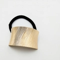 Elegant black hair tie with gold textured metal arch accent for stylish ponytails - Diagonal Stripe Craft (Hair Tie 27)