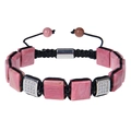 Macro view of woven bracelet with square pink stone and micro-pave zircon detail - Red Wood Grain Stone
