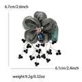 Lace flower brooch with dark gray mesh petals, green leaves and black bead tassels - Gray