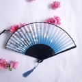 Chinese style folding fan with blue plum blossom patterns and blue tassel pendant - Blue & White Gradient Plum Blossom Butterfly Style (Ladies' Fan-43)