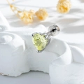 Delicate silver heart-cut yellow gem screw-back earring displayed on art stone - Heart Shaped Fruit Green Zirconia Style (A1086-5)