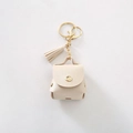 Mini beige kunstlederen oortelefoonhoesje met kwastje voor Airpods en kleine accessoires - AirPods 1/2e generatie / Beige
