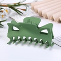 Detail of green matte plastic geometric hair claw clip on white surface with plants - Frosted Green / 9.5CM