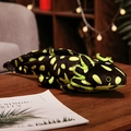 Lying black axolotl plush toy with neon green spots on a cozy wooden desk - Type B (Prone Position) / 45cm / Stripe