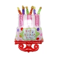 Pink birthday cake shaped foil balloon with candles and Happy Birthday text - Red Base Cake Balloon