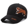 Black cotton baseball cap with detailed tiger embroidery and side signature on white background - Black with Yellow Embroidery