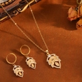 Elegant golden leaf jewelry set with opal stone and sparkling zircon accents - Gold White Stone Leaf Jewelry Set