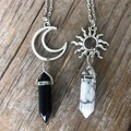 Vintage sun and moon necklace with hexagonal crystal pendants on a rustic wood background - Sun + Moon Set/2PCS Set