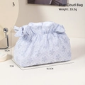 Light blue floral lace cosmetic bag with ribbon bow and compact travel dimensions - Blue Cloud Bag
