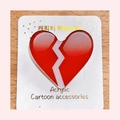 Red heart-shaped acrylic pin with white lightning crack design on display card - Broken Heart / Brooch Style