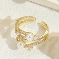 Three-layer open ring in gold finish with white pearls and sparkling cubic zirconia - Cross Zirconia Style