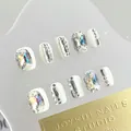 Macro shot of handmade press-on nails with luxury rhinestones and silver metal accents - By1625 Peerless Elegance / Glue Type