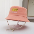 Close-up of pink canvas bucket hat with triple yellow smiles and adjustable chin strap - 50-52cm (2-6 Years) / Orange
