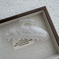 Detailed view of large transparent hair claw clip with white lace pattern texture - Sycee / Ingot / White
