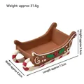 Miniature resin Christmas sleigh with candy cane runners and holly leaf details - Sled