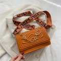 Caramel chevron quilted crossbody bag with gold floral chain and woven wide strap - Brown