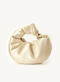 Detail of pleated satin evening bag with knotted handle in soft beige finish - Champagne