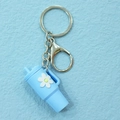 Miniature light blue Stanley-style water bottle keychain with a small daisy flower charm - Keychain / Sky Blue Flower Cup Keychain