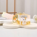 Vue détaillée du porte-clés chat porte-bonheur avec sable mouvant et dragonne bubble orange - Dragonne dégradée + Chat de la chance / Maneki Neko - Fortune