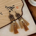 Macro shot of vintage bronze sunflower earrings with beads and cotton fringe tassels - 39# Ear Hook - Brown Sunflower