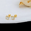Macro shot of gold butterfly ear studs with sparkling stone and screw back closure - White Crystal Butterfly / Gold/White