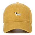 Detail of dachshund embroidery on mustard yellow washed cotton baseball cap texture - One Size / Yellow