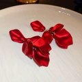 Macro shot of elegant red rose petal tassel earrings resting on a white ceramic plate - 7# Silver Needle - Red - Flower