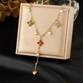 Golden Y-necklace with multi-colored clover charms and pearls on a jewelry box - Colorful Clover Pearl Pendant Style (N3511)